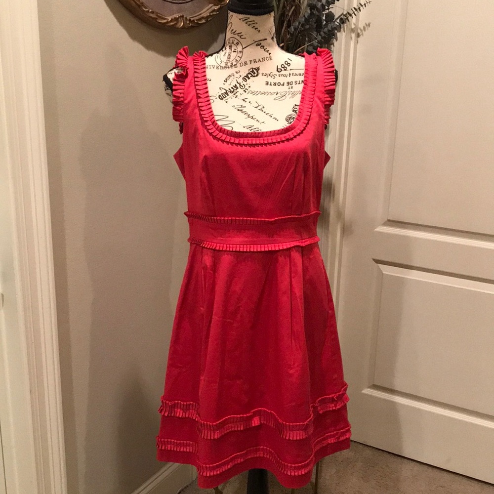 Poppy colored dress with accordion pleats all around Size Small